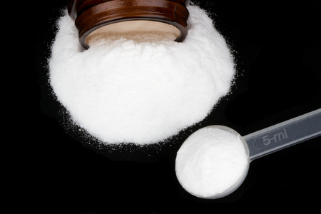 39972084 - creatine monohydrate on black background